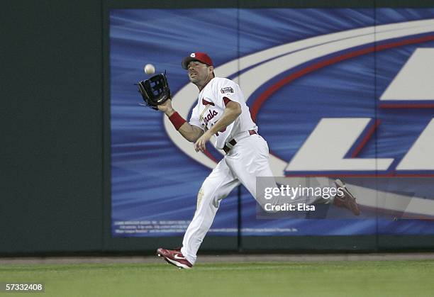Jim Edmonds of the St. Louis Cardinals makes the catch for the last out of the game against the Milwaukee Brewers on April 12, 2006 at Busch Stadium...