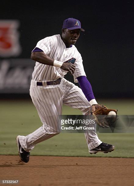 Second baseman Orlando Hudson of the Arizona Diamondbacks fields a ground ball against the Colorado Rockies at Chase Field on April 12, 2006 in...