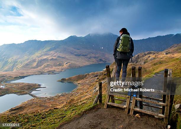 walker on the pyg track ascending snowdon - snowdonia national park stock pictures, royalty-free photos & images