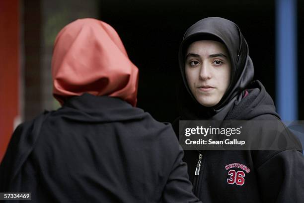 Songol Surucu , sister of Alpaslan and Mutlu Surucu, waits for her two brothers outside a Berlin courthouse after a court acquitted them in the...