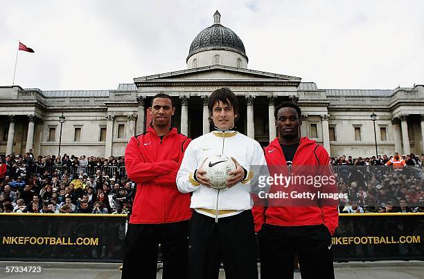 Anton Ferdinand, Joe Cole and Michael Essien pose prior to an exhibition match at the launch of Nike's Joga 3 Tournament at Trafalgar Square on April...