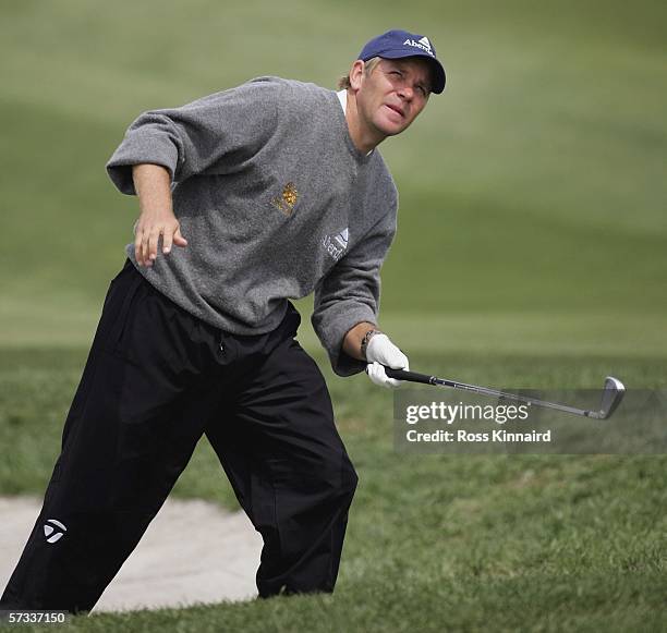 Simon Yates of Scotland plays his second shot on the par four 9th hole durng the second round of the Volvo China Open at the Beijing Honghua...