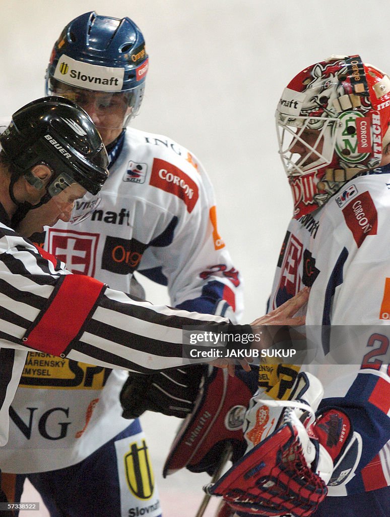 Head coach Peter Jonak (L) pushes Slovak