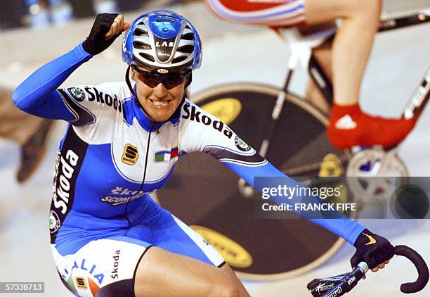 Italy's Vera Carrara celebrates after winning the women's point race final during the UCI Track Cycling World Championships in Bordeaux, 14 April...