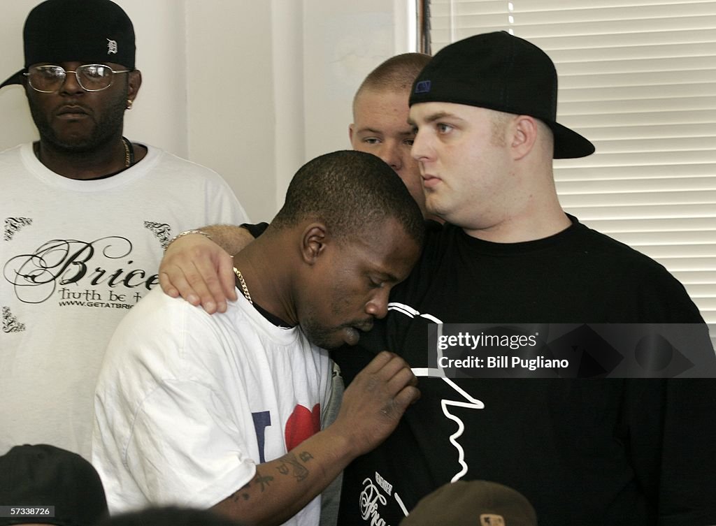 Hip Hop artist Supa MC buries his head into the chest of Mike... News ...