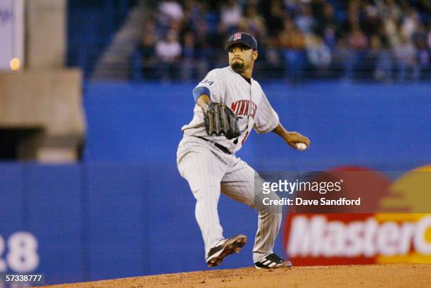 Johan Santana of the Minnesota Twins pitches against the Toronto Blue Jays during the home opener at the Rogers Centre on April 4, 2006 in Toronto,...
