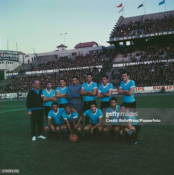 The Uruguay national football team posed together on a football pitch on 29th June 1966 prior to their competing in the 1966 FIFA World Cup finals in...