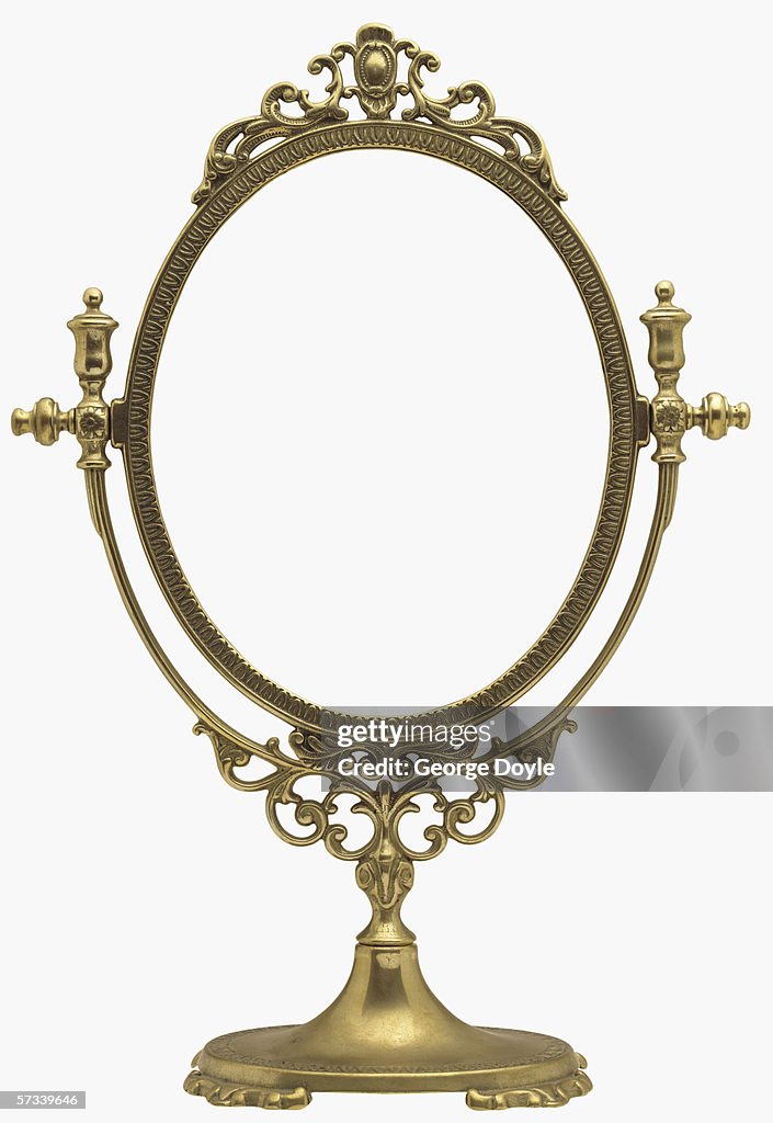 An antique mirror frame
