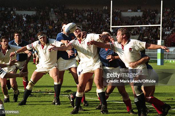 October 1991 Paris, Rugby World Cup - France v England: Wade Dooley, Paul Ackford and Jeff Probyn compete for the ball at a lineout.
