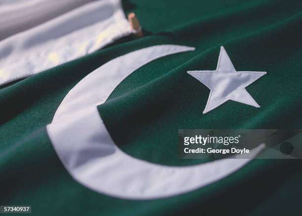 close-up of the flag of pakistan - pakistani flag imagens e fotografias de stock
