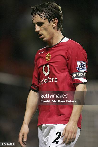 Captain Gary Neville of Manchester United looks disappointed at the final whistle of the Barclays Premiership match between Manchester United and...