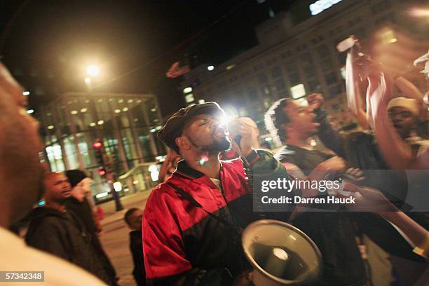 Milwaukee city alderman Mike McGee Jr. Chants to supporters infront of the downtown police department after a verdict of not guilty came back on four...