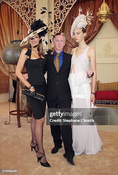 Model Tara moss, hat designer Philip Treacy and Sophie Ward pose at the Emirates marquee during the Sydney Easter Race Carnival at the Royal Randwick...