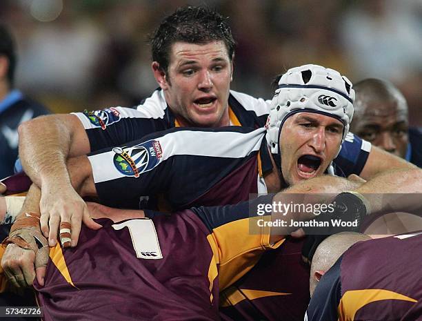 Mark Connors and Tom McVerry of the Reds in action during the round ten Super 14 match between the Queensland Reds and Bulls at Suncorp Stadium on...