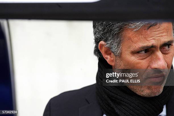 Bolton, UNITED KINGDOM: Chelsea manager Jose Mourinho sits in the dug out before his team take on Bolton Wanderers in their English Premiership...