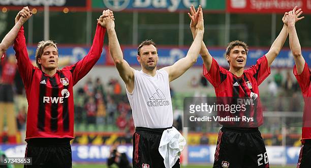 Clemens Fritz;Jens Nowotny and Michael Papadopulos of Leverkusen celebrate after the final whistle the Bundesliga match between Bayer Leverkusen and...