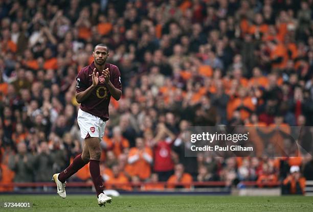 Thierry Henry of Arsenal applauds the fans after being substituted during the Barclays Premiership match between Arsenal and West Bromwich Albion at...