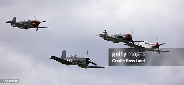 Yak 3-m Corsair F4U Lavochkin LA-9 and a P-51D Mustang make a low pass over the airfield during the 'Warbirds over Wanaka' International Airshow on...