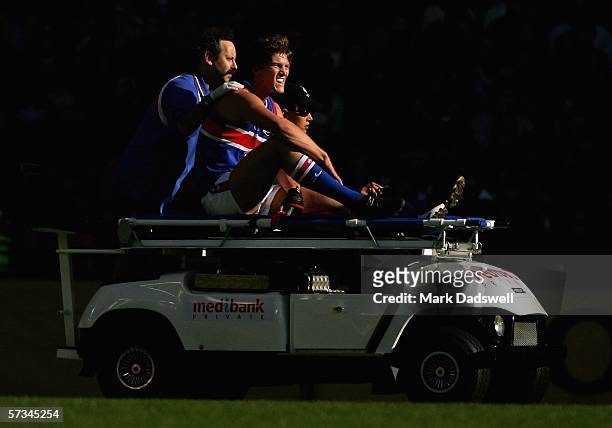 Will Minson for the Bulldogs is driven towards the race during the round three AFL match between the Essendon Bombers and the Western Bulldogs at the...