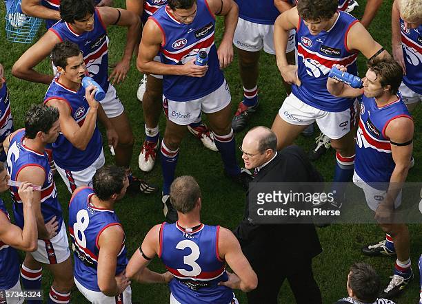 Rodney Eade, Coach of the Bulldogs addresses his players during the round three AFL match between the Essendon Bombers and the Western Bulldogs at...