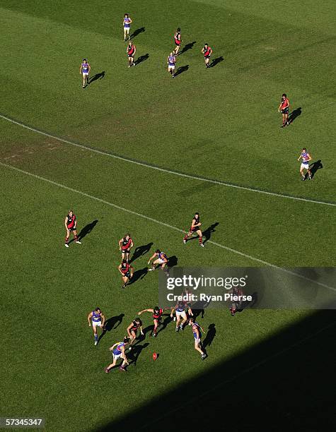 Bombers and Bulldogs players in action during the round three AFL match between the Essendon Bombers and the Western Bulldogs at the Telstra Dome...