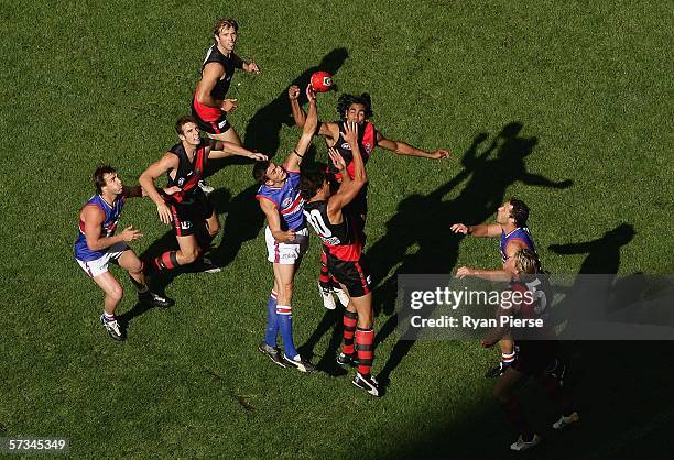 Bombers and Bulldogs players in action during the round three AFL match between the Essendon Bombers and the Western Bulldogs at the Telstra Dome...