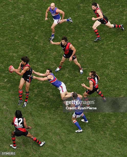 Bombers and Bulldogs players in action during the round three AFL match between the Essendon Bombers and the Western Bulldogs at the Telstra Dome...