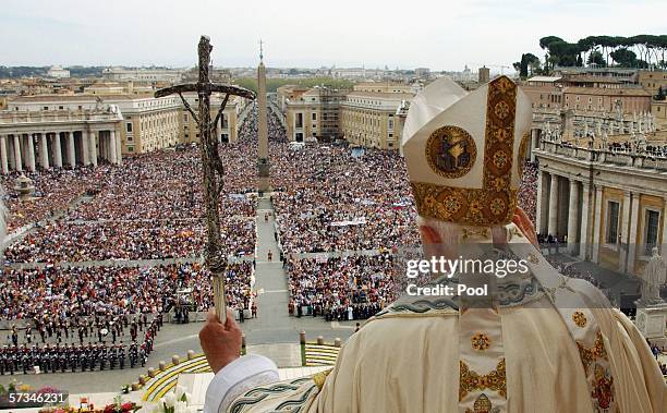 Pope Benedict XVI gives his blessing "Urbi et Orbi" at the end of the Easter Mass at Saint Peter's Square, April 14, 2006 in Vatican City Italy. The...