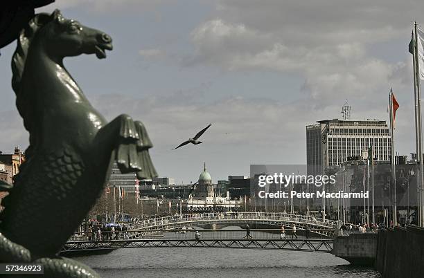 The Ha'Penny Bridge over the River Liffey on April 16, 2006 in Dublin, Ireland. Modern Irish Defence forces are taking part in commerorations of the...