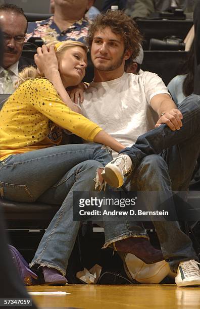 Paris Hilton gets close with Stavros Niarchos III as the Los Angeles Lakers play against the Phoenix Suns on April 16, 2006 at Staples Center in Los...