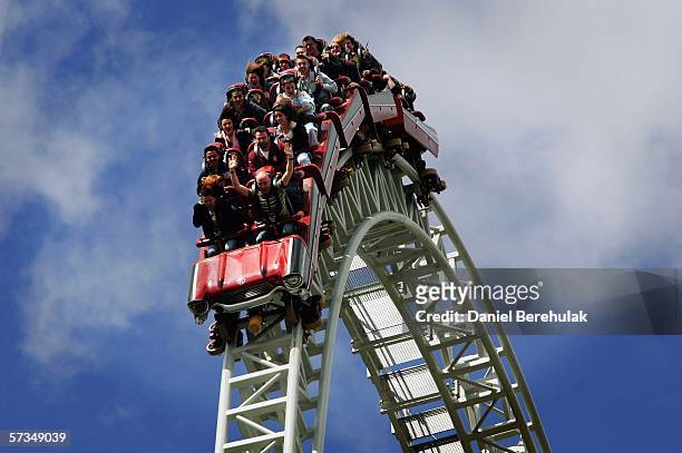 People ride the new Stealth rollercoaster at Thorpe Park on April 17, 2006 in Chertsey, England. Thousands of people flocked to see the new...