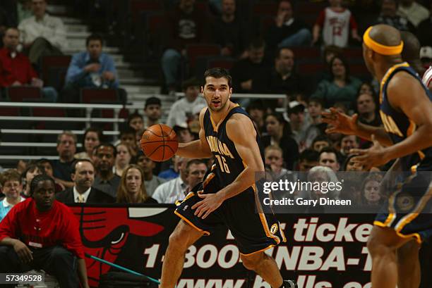 Peja Stojakovic of the Indiana Pacers moves the ball against the Chicago Bulls at the United Center on April 4, 2006 in Chicago, Illinois. The Bulls...