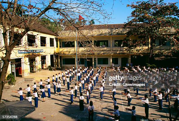 school yard exercise, nha trang, vietnam - vietnam school stock pictures, royalty-free photos & images