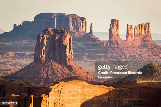 the mittens and the three sisters - monument valley stock pictures, royalty-free photos & images