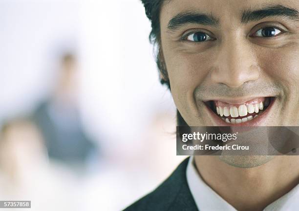young businessman smiling, portrait - person mouth open stock pictures, royalty-free photos & images