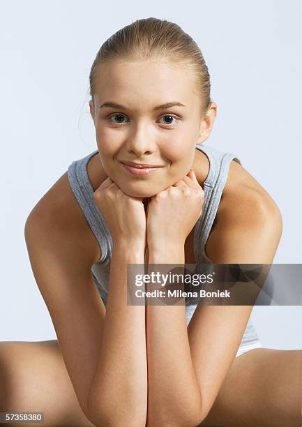 woman sitting, leaning on elbows - double facepalm stock pictures, royalty-free photos & images
