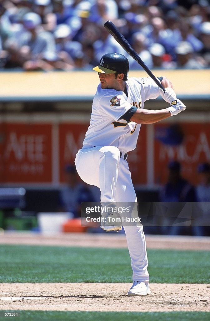 Eric Chavez of the Oakland Athletics pulls back to swing during the News  Photo - Getty Images