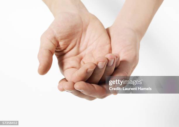 cupped hands - hands cupped stock pictures, royalty-free photos & images