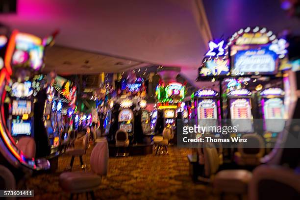 gaming machines in a casino - casino stock pictures, royalty-free photos & images