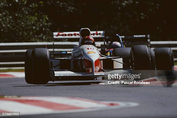 Alex Caffi of Italy drives the Footwork Grand Prix International Footwork FA12C Cosworth V8 during practice for the Belgian Grand Prix on 24 August...