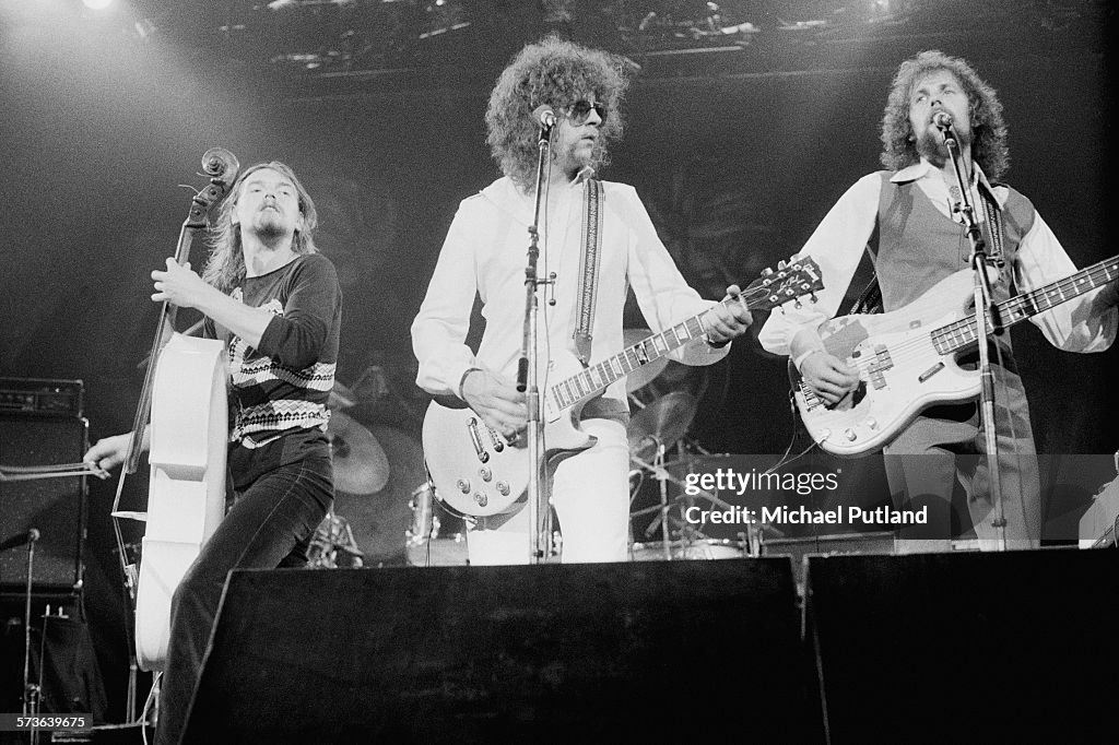 Elo In Concert Hugh McDowell, Jeff Lynne and Kelly Groucutt performing with British ...