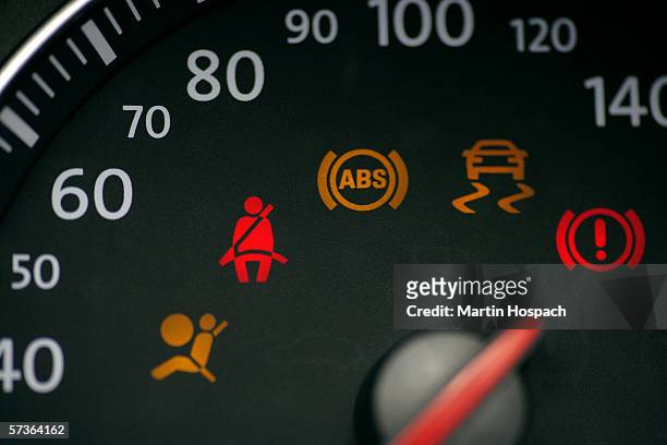 car speedometer with illuminated seat belt sign - dashboard vehicle part imagens e fotografias de stock