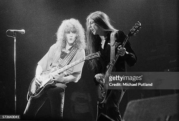 Guitarists Brian Robertson and Scott Gorham performing with Irish rock group Thin Lizzy, 12th July 1976.