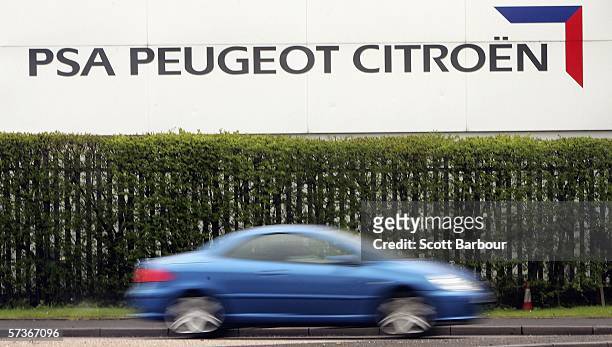 Peugeot car leaves the PSA Peugeot Citroen Ryton plant on April 19, 2006 in Coventry, England. Unions have condemned the announcement that the plant...
