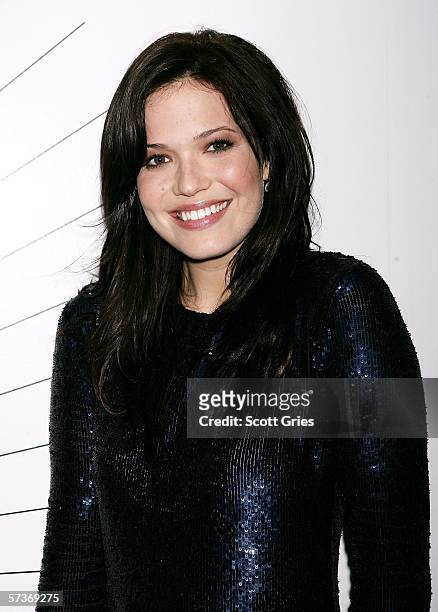 Singer/actress Mandy Moore poses for a photo backstage during MTV's Total Request Live at the MTV Times Square Studios on April 19, 2006 in New York...