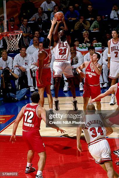 Michael Jordan of the Chicago Bulls shoots a jump shot against Olympiakos during the 1997 McDonalds Championships played at the Palais Omnisports de...