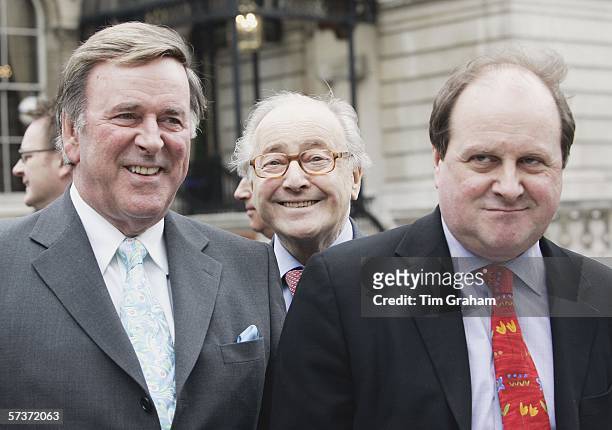 Radio presenters Terry Wogan, David Jacobs and James Naughtie pose outside the BBC Broadcasting House as they await the arrival of Queen Elizabeth II...