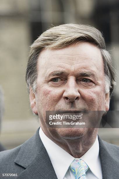 Radio presenter Terry Wogan awaits the arrival of Queen Elizabeth II outside the BBC Broadcasting House to mark the 80th anniversary of the granting...