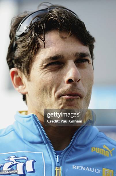 Giancarlo Fisichella of Italy and Renault looks on in the paddock prior to the San Marino Formula One Grand Prix at the San Marino Circuit on April...