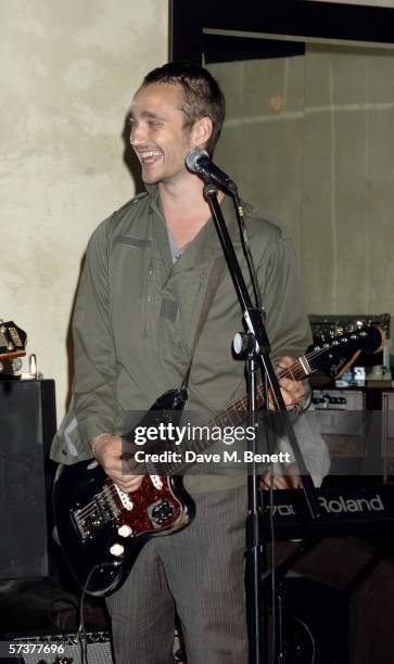 Singer Rasmus Walter Hansen of Grand Avenue performs at the private VIP party thrown by model Helena Christensen in association with Swarovski and...